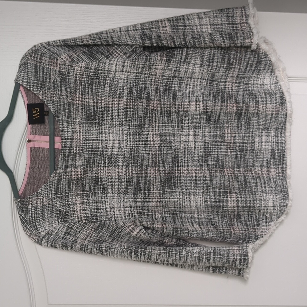 W5 black/white/pink top with fringe detail on sleeves and bottom, zipper on back